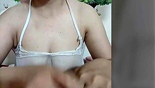 Is juliana touching her swollen nipples?