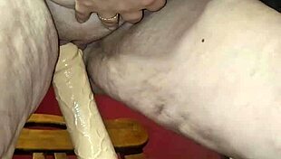 Redhead milf rides dildo and squirts