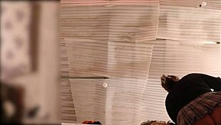 Wow, the big ass maid folds clothes without panties while being spied on live.