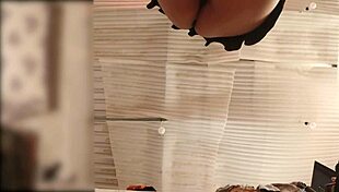 Wow, the big ass maid folds clothes without panties while being spied on live.