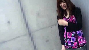 hitomi misaki walks with a remote vibe buzzing hard. her japanese adventure gets wild on the streets.