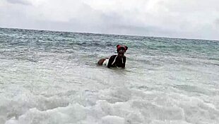 monika fox swims in the sea, then fucks her pussy with a big dildo on the white sand beach