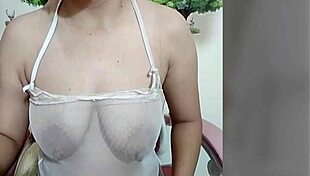 Is juliana touching her swollen nipples?