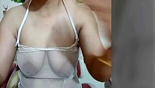 Is juliana touching her swollen nipples?