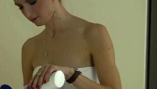 This delicate redhead girl is subtly masturbating her pussy