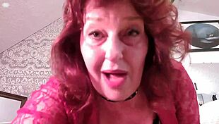 Old redhead gets wet in fishnets and lace lingerie