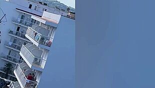 Enjoying some public sex with the guys on the balcony