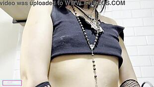 Gotica inserts toy into vagina