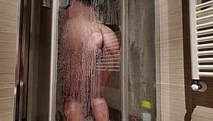 Big Breasted Woman Shaves In The Shower