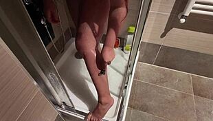 Big Breasted Woman Shaves In The Shower