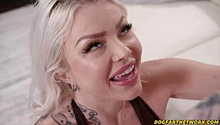 Tatted blondie licks the rapper's huge cock