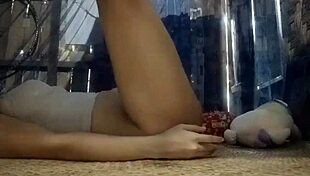 The Girl Does Exercises Before Taking a Bath at Home