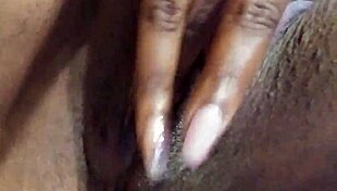 fingers make this ebony milf wet with orgasm