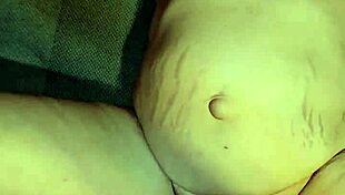 Savoring the essence of her passion in a sensual moment.