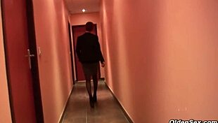 french businesswoman in an office encounter with a mature redhead