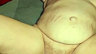 Savoring the essence of her passion in a sensual moment.