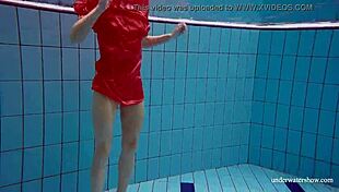 Avenna swims nude in the pool, her tight pussy exposed