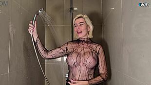 Blonde Babe Seduces in Shower with See-Through Top 😍