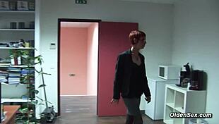 french businesswoman in an office encounter with a mature redhead