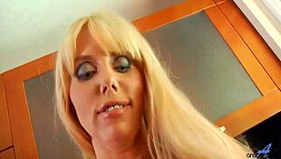 karen explores her toys in the kitchen