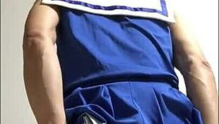 Yo, check this crossdress cheerleader working a dildo like a pro!