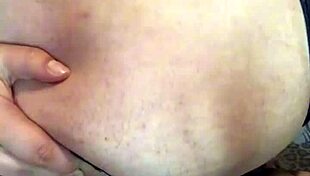 Student with natural big tits and big clit performs striptease, inserts anal plug, and masturbates with giant dildo.