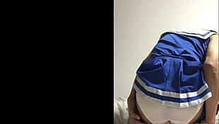 Yo, check this crossdress cheerleader working a dildo like a pro!