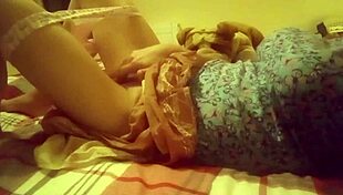 Beautiful girl repeatedly wets her panties in bedroom