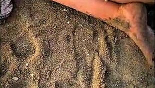 tall muscular bodybuilder gets handjob and blowjob on beach