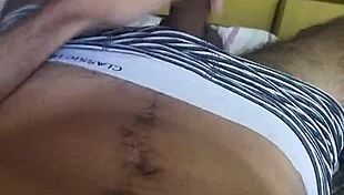 In the bedroom, skinny Brazilian girl with huge legs moans during guided masturbation with monster cock, talking dirty until orgasm