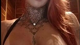 Redhead Teases Web With Pink Tits