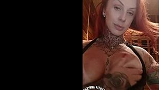 Redhead Teases Web With Pink Tits