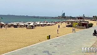 Perfect small tits spotted on Barcelona nude beach