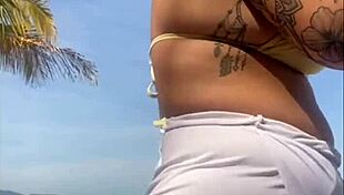 Oops, these shorts are showing my big pussy on the beach 😏