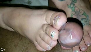 Wife masters an incredible toejob with a monster BBC while keeping it spicy