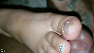 Wife masters an incredible toejob with a monster BBC while keeping it spicy