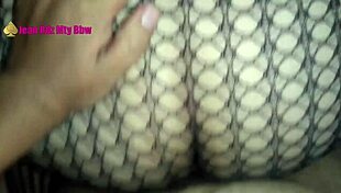 the fat bbw milf in fishnets gives a footjob to the prostitute while showing her big tits and ass