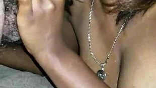 Ebony teen gives sexy blowjob to big cock