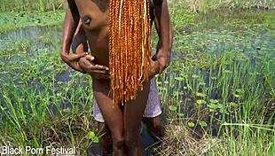 skinny african woman assists tourist in river exploration