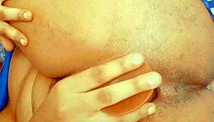 Hairy lesbian fingers her narrow ass, masturbates, and squirts in solo anal play.
