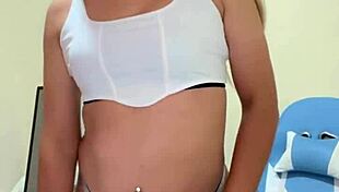 Small transsexual pulls cock in crossdressing scene