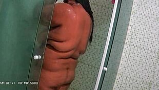 hidden camera catches brazilian milf teacher shaving in lingerie