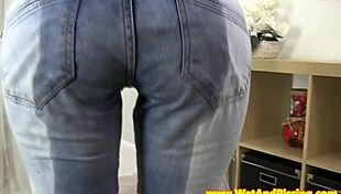 Babe Intensely Pees Through Denim Pants In Fetish Act