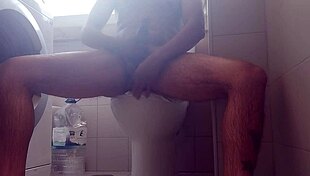 Feeling the rush as he shaves his big dick and spits out lots of milk.
