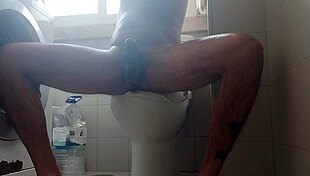 Feeling the rush as he shaves his big dick and spits out lots of milk.