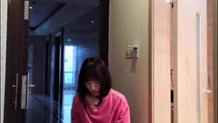 Asian ladyboy masturbates her dick, flashes it to woman, and cums.