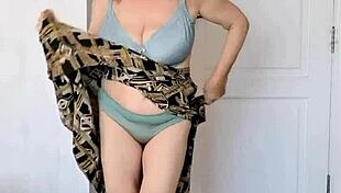 Look At This Busty Granny Masturbating!