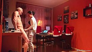 Intense couple engages in wild oral sex and licking in kitchen.