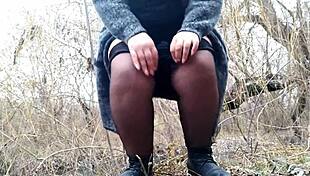 Plump mother-in-law touches wet pussy outdoors!