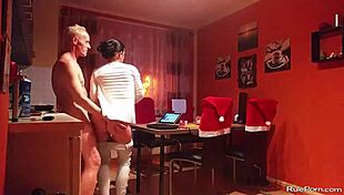 Intense couple engages in wild oral sex and licking in kitchen.